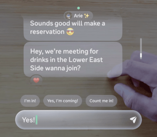 Meta AR glasses display showing a live messaging interface with suggested replies and neural text input