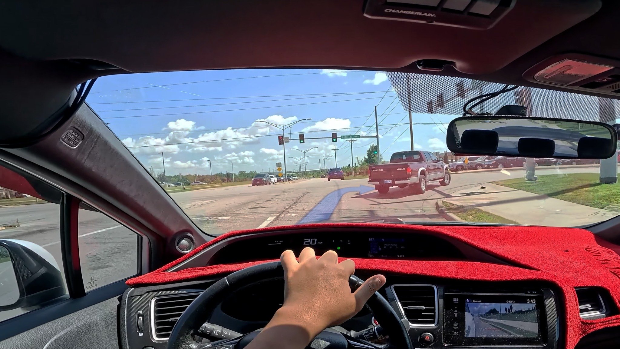 Concept B sunny road scene with a simple AR turn arrow